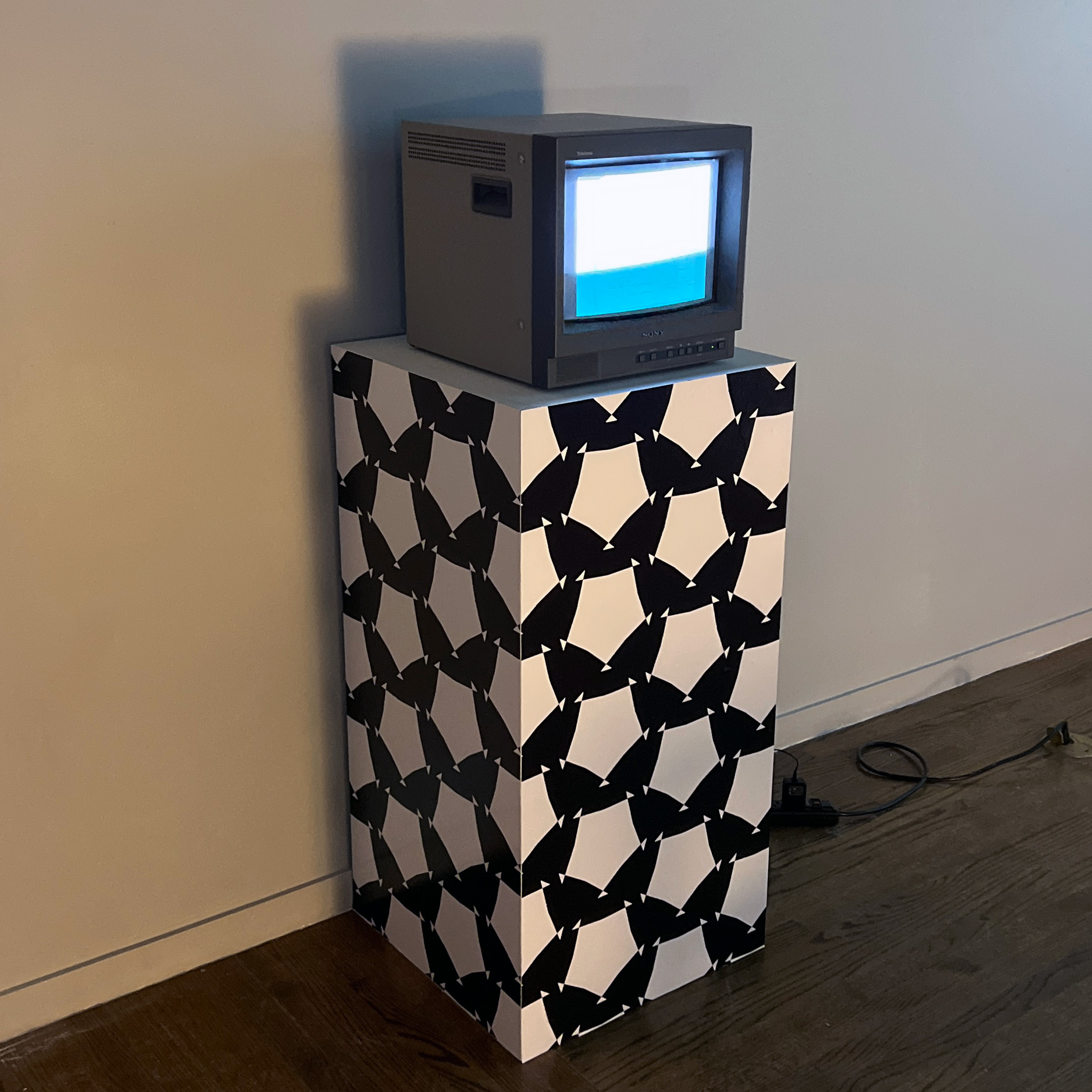 Pedestal in exhibition with generative patterns